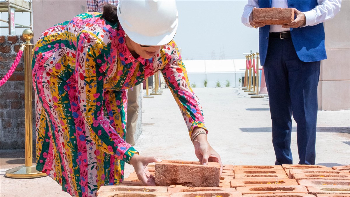 Hon. Priti Patel places a brick on the mandir and offers her sincerest prayers