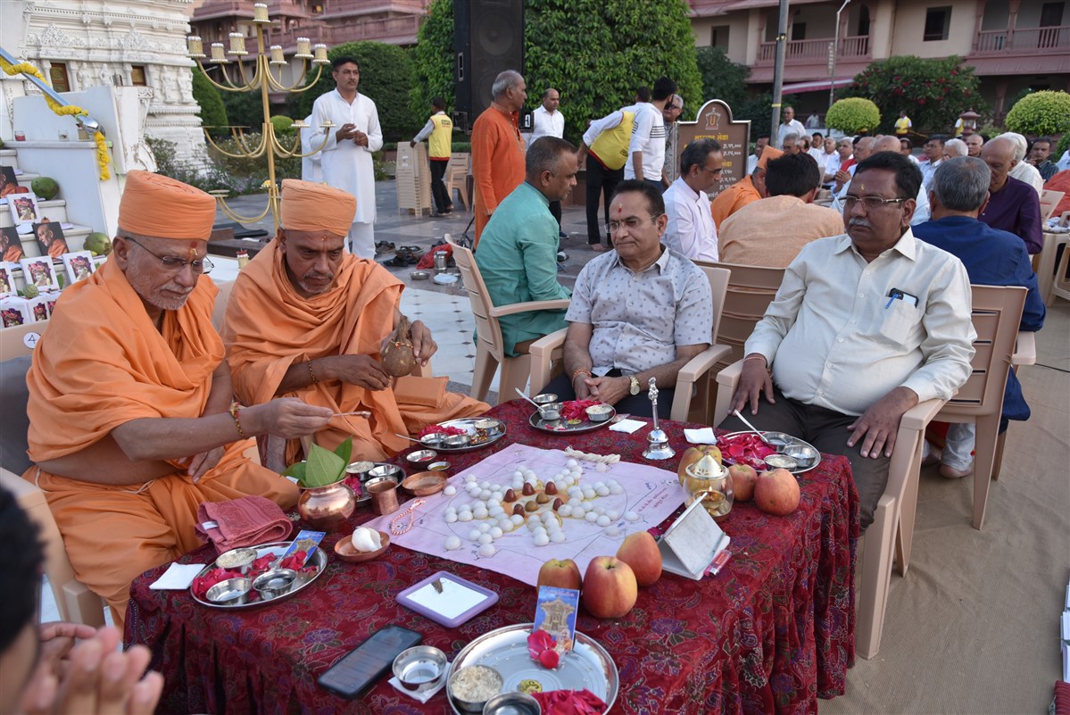 Sadhus and devotees perform the Chopda Pujan mahapuja rituals