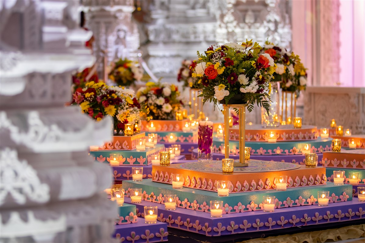 A traditional display of candles and lanterns lit inside the Mandir.
