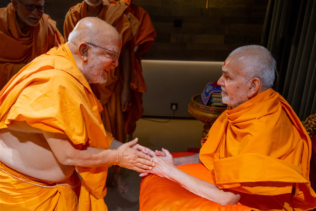 Swamishri blesses Pujya Ghanshyamcharan Swami