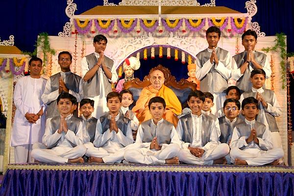 Members of BAPS Children's Forum, Amdavad, perform a kirtan-bhakti program in Swamishri's morning puja