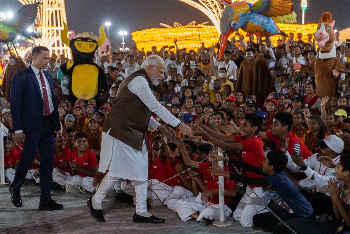 PM Narendra Modi greets children