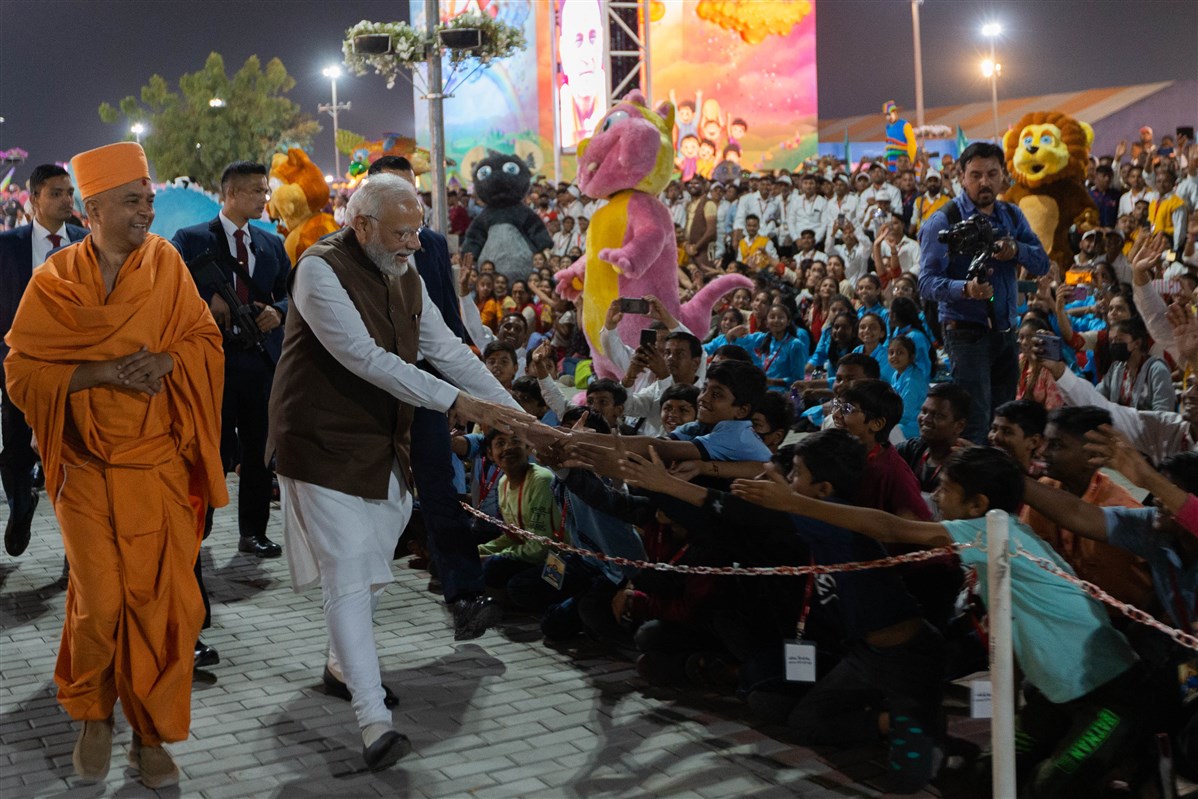 PM Narendra Modi greets children