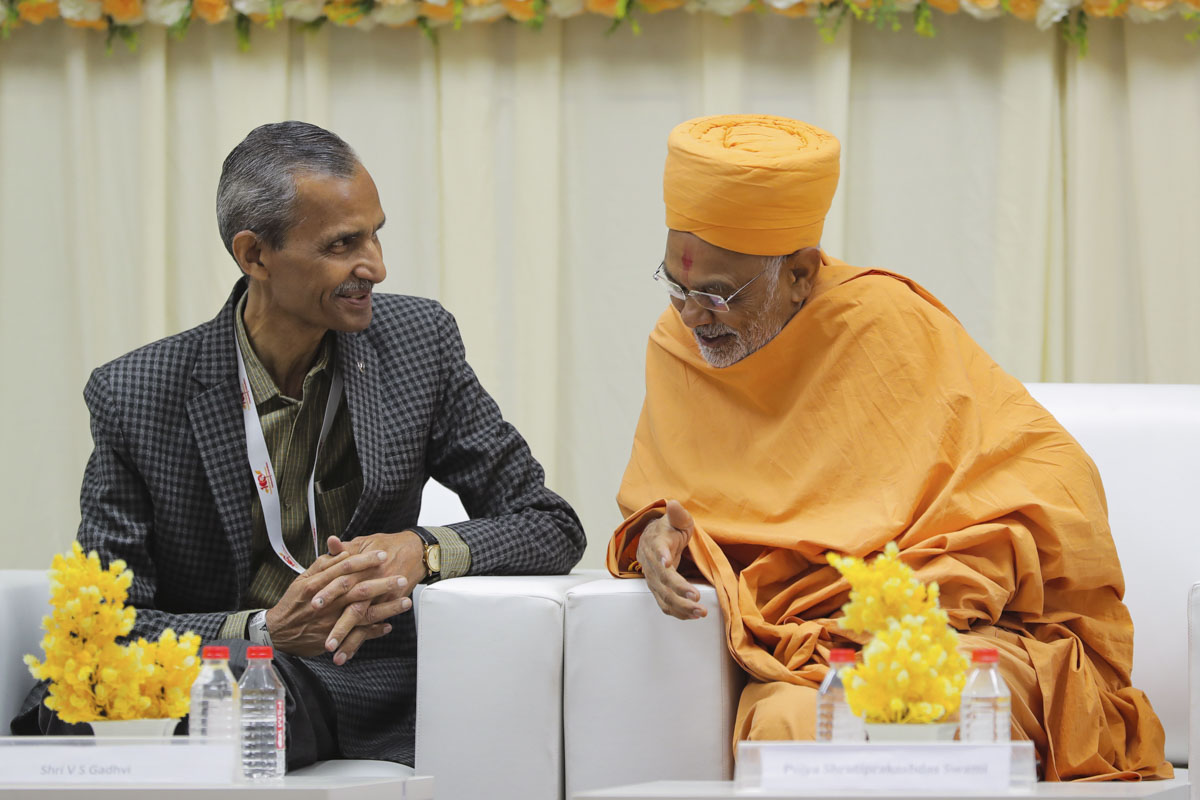 Shrutiprakashdas Swami conversing with Shri V.S. Gadhvi, an IAS officer