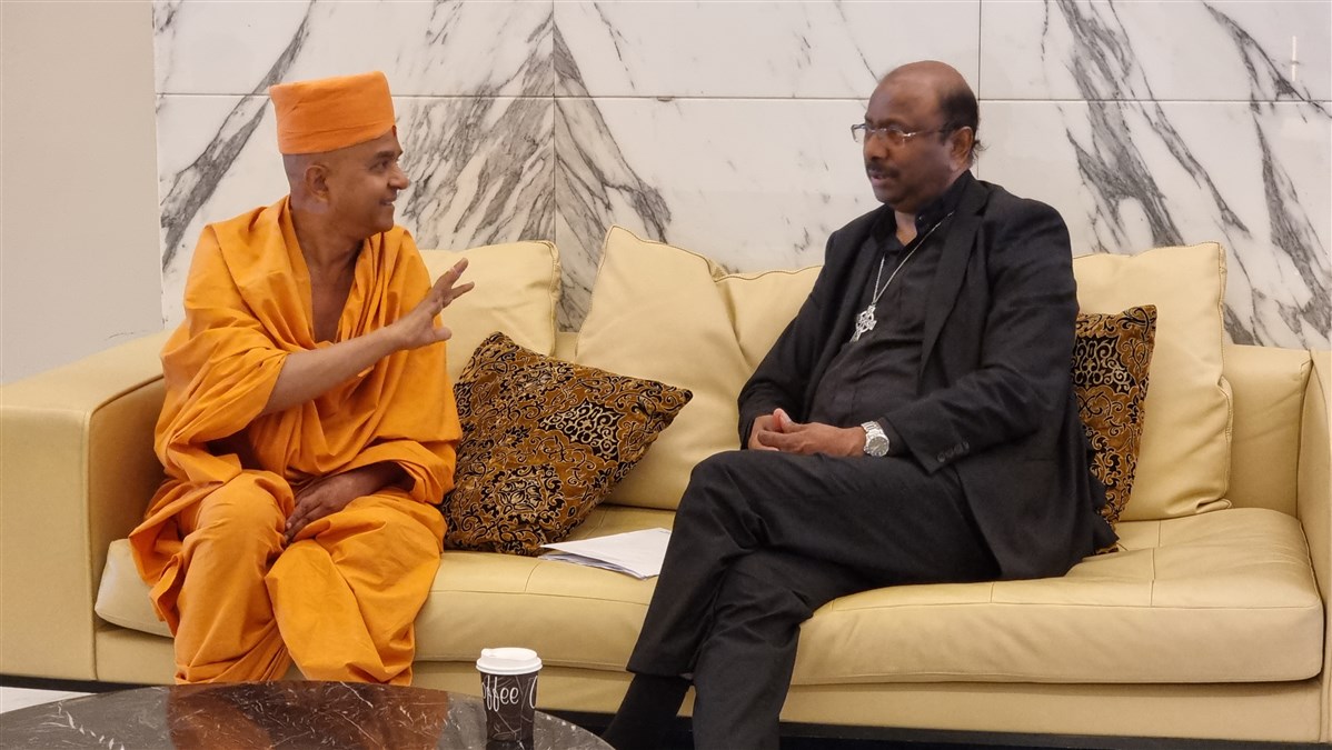 Swami Brahmaviharidas and Rev. Prof. Dr. Jerry Pillay, the General Secretary of the World Council of Churches in Geneva, discuss the central message of the summit
