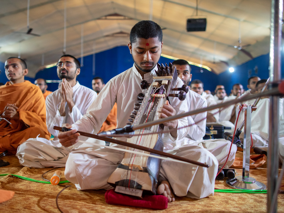 A sadhak plays the sarangi