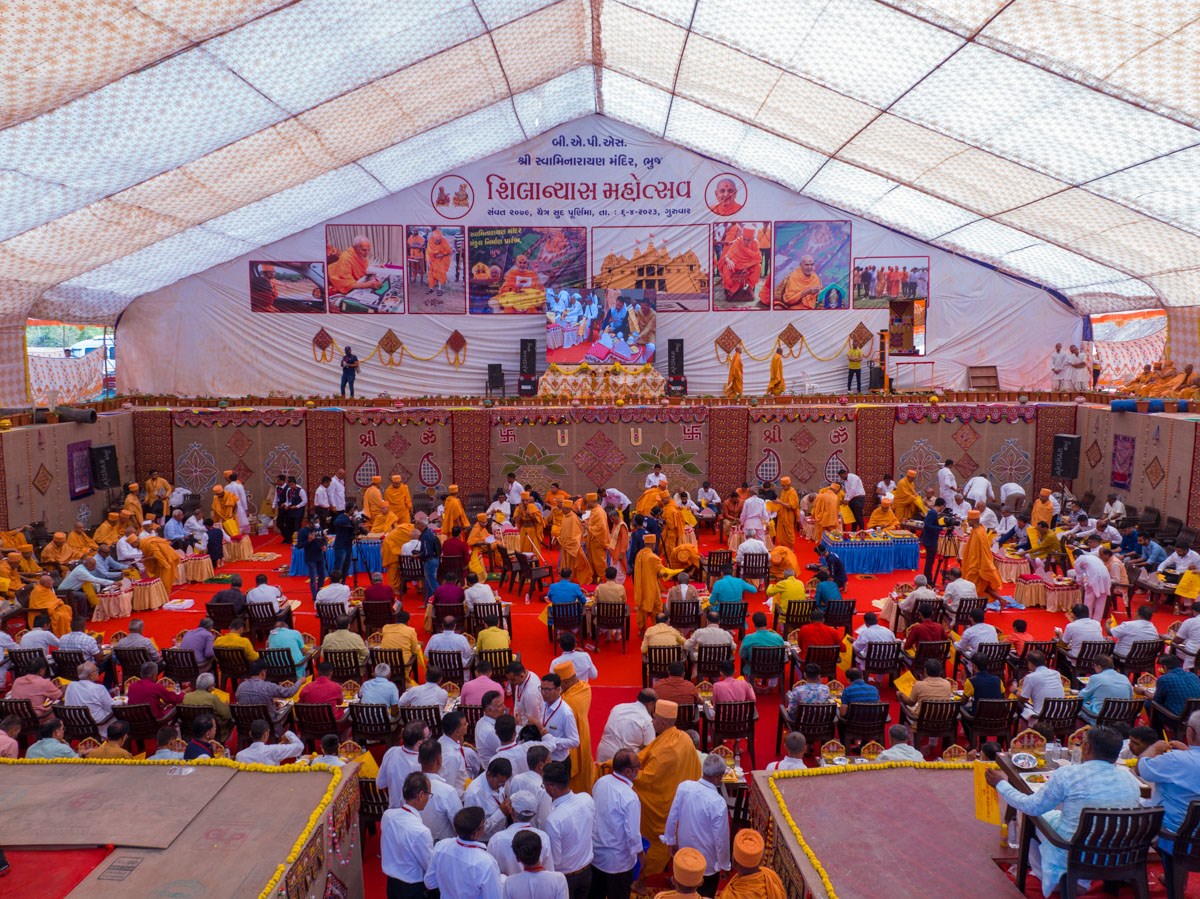 Sadhus and devotees participate in the mahapuja rituals