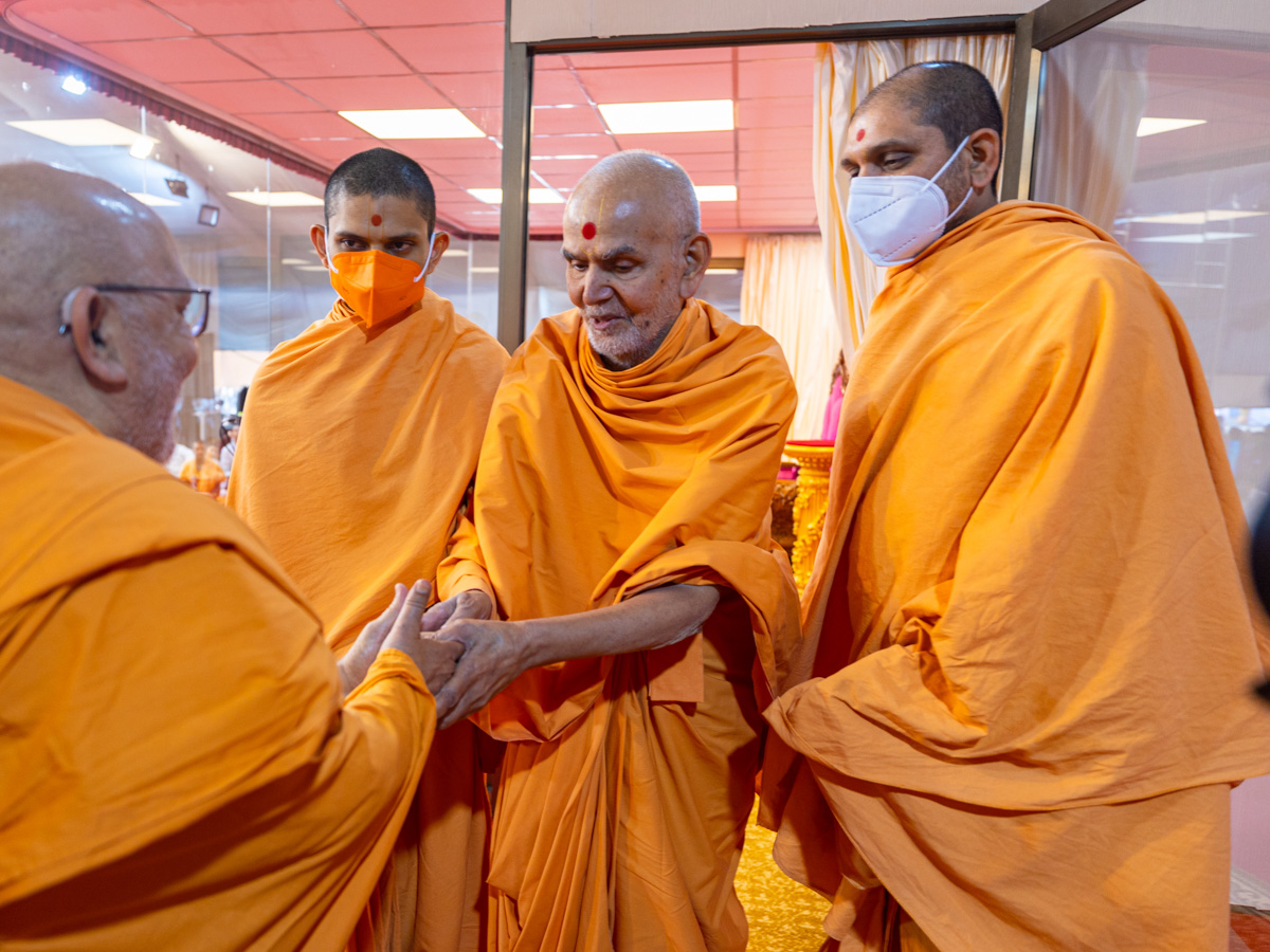 Swamishri blesses Pujya Ghanshyamcharan Swami