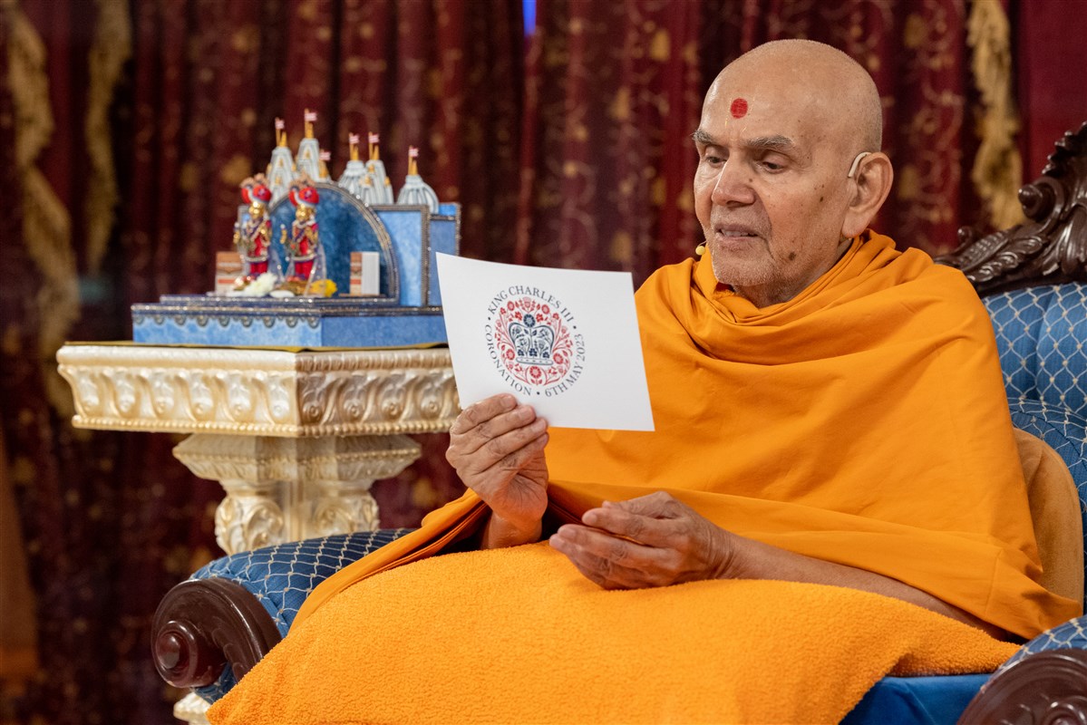 Swamishri offered his own message of congratulations and prayers for the King, the Royal Family and the people of the United Kingdom <br>For more about the coronation tribute led by Swamishri, please click <a href='https://www.baps.org/News/2023/Mahant-Swami-Maharaj-Leads-Coronation-Tribute-to-His-Majesty-King-Charles-III-23519.aspx' target='blank' style='text-decoration:underline; color:blue;' >here</a>