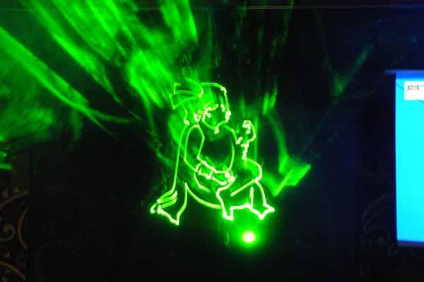 A laser show amazes the assembly