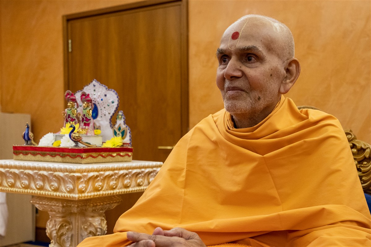Swamishri listens attentively to the swamis