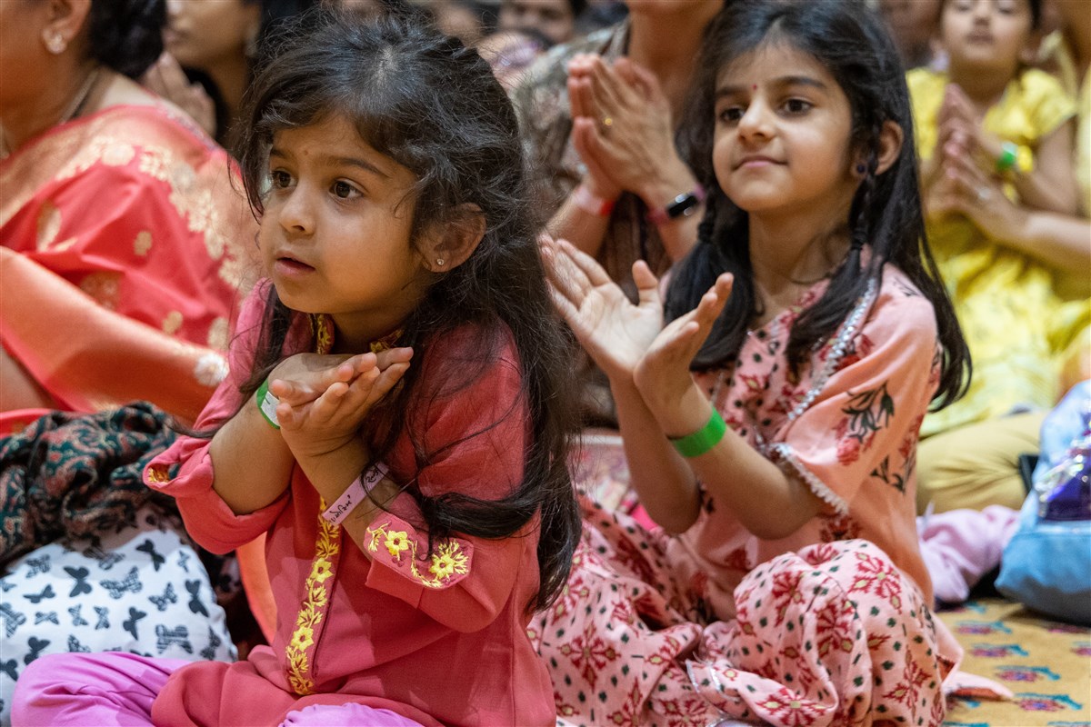 Young children respond with folded hands