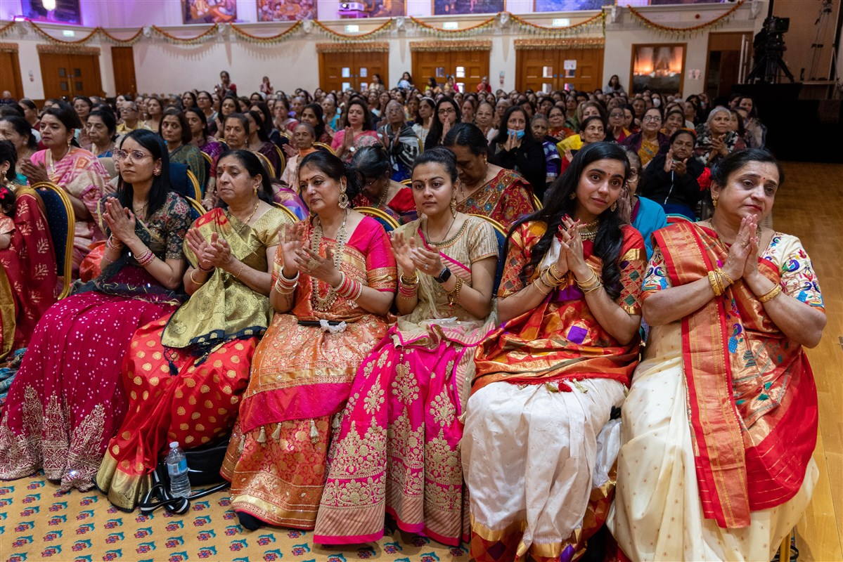 The mothers and sisters of the sadhaks observe the final diksha ceremony