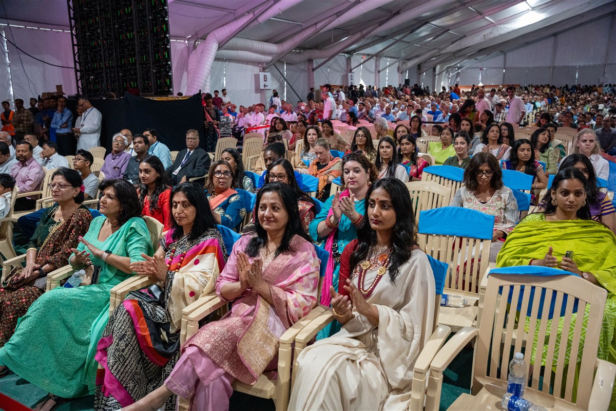 Community members participate in the evening program