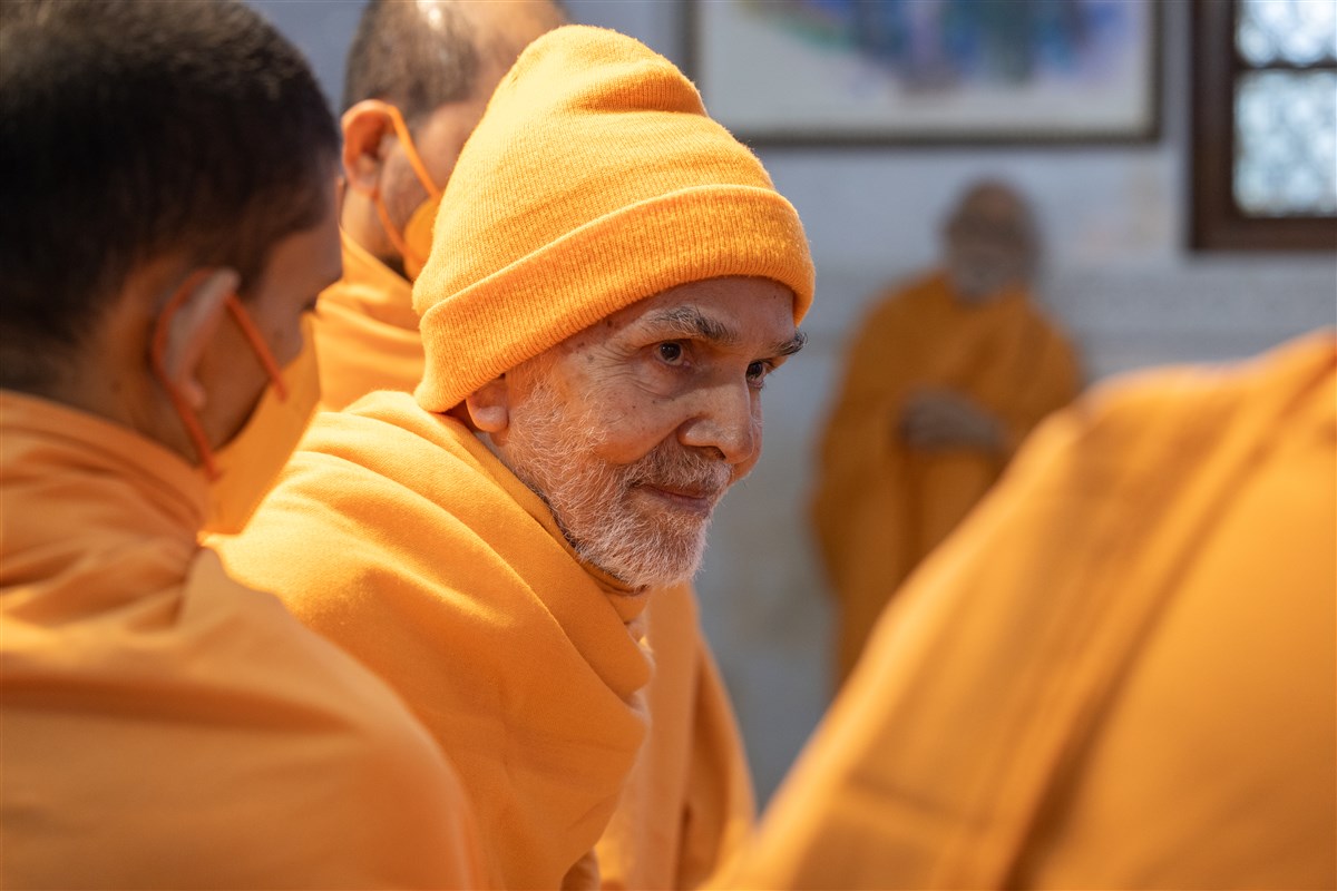 Swamishri affectionately looks at a swami
