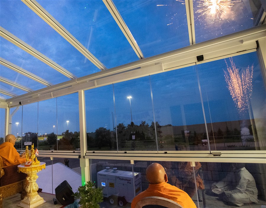 Swamishri observes the fireworks display in celebration of Canada Day