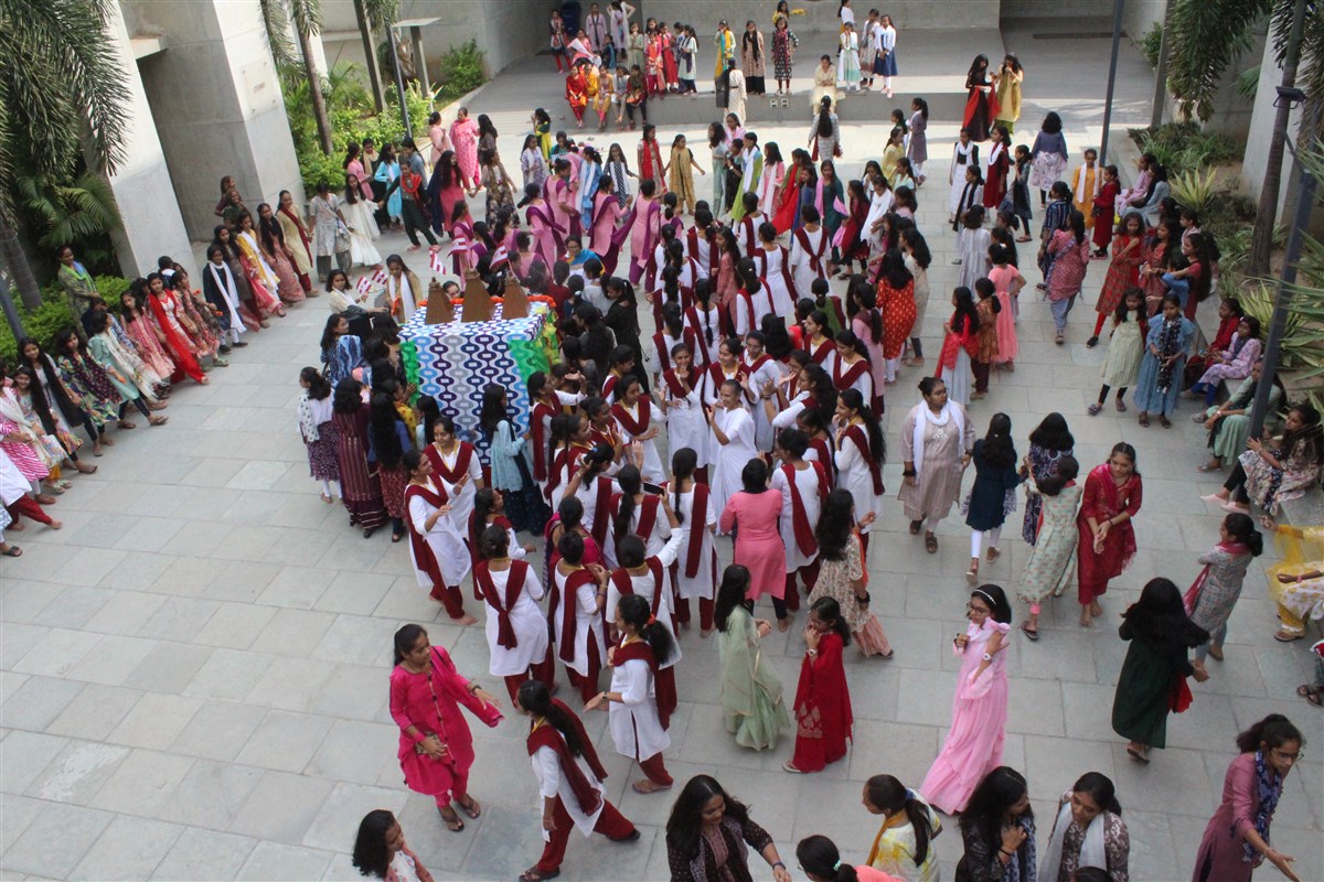 Students performing Garba during celebration.