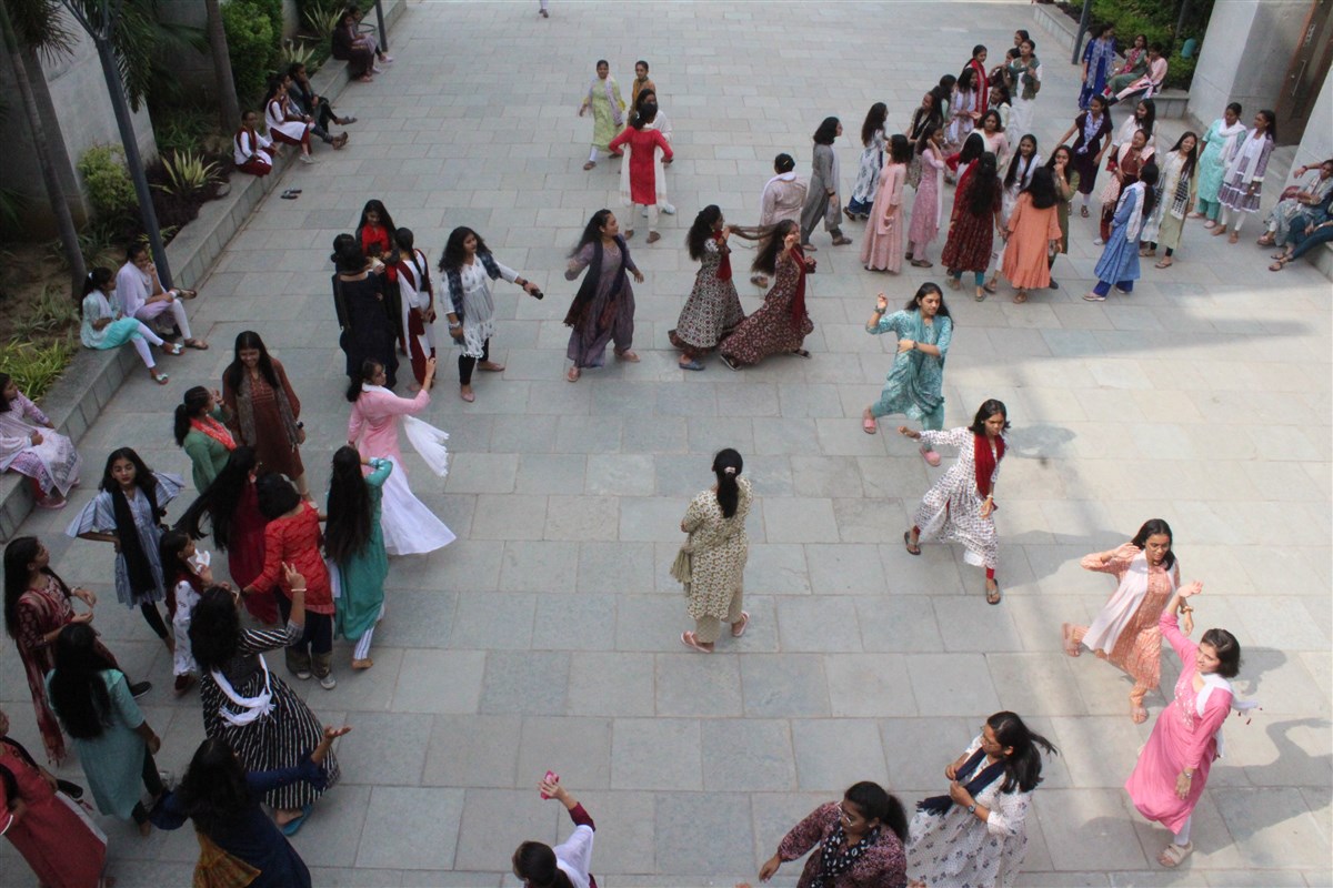 Students performing Garba during celebration.