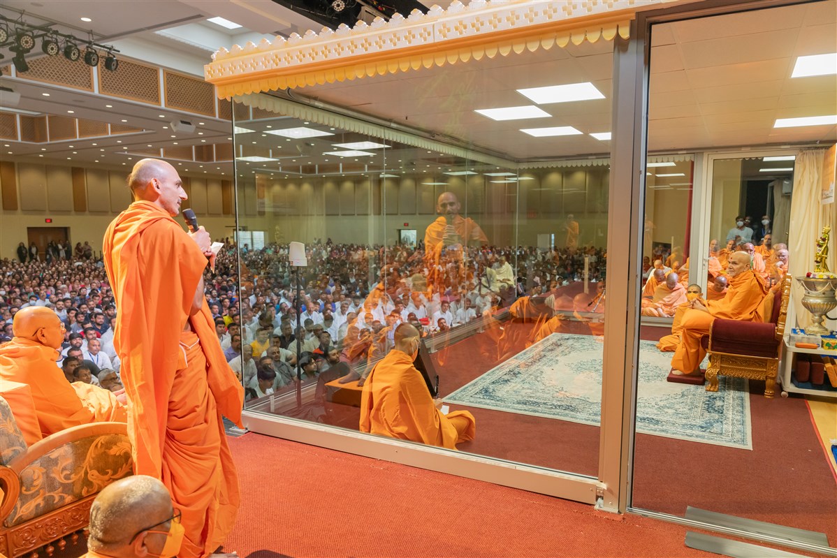 Swamishri actively listens to a Swami