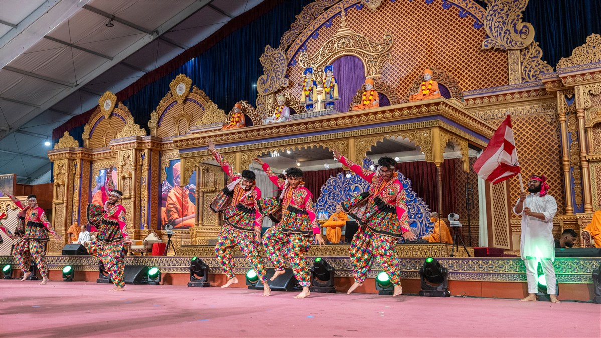 Youths perform a cultural dance