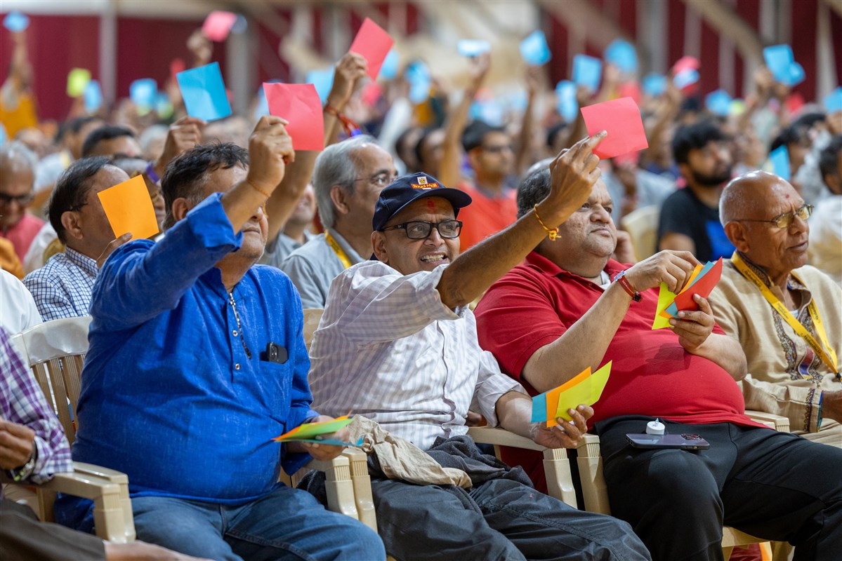 Devotees participate in the interactive session