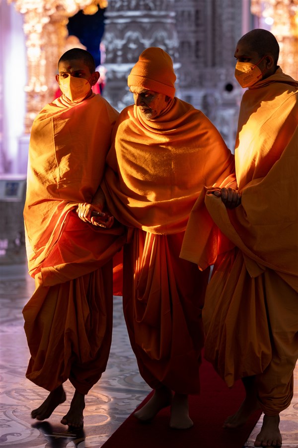 Morning light graces Swamishri within the mandir