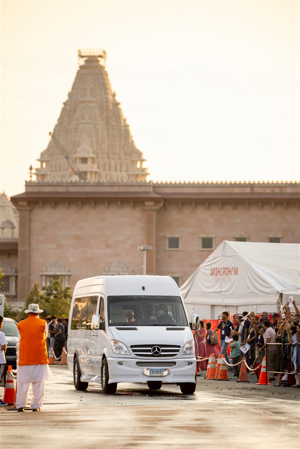 Swamishri on his way to the evening assembly