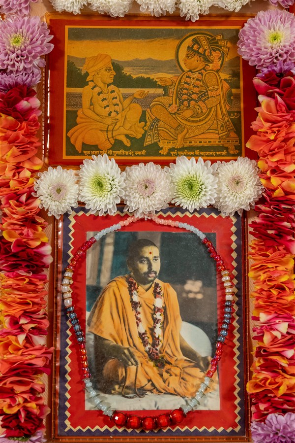 Murtis of Parabrahma Bhagwan Swaminarayan,  Aksharbrahma Gunatitanand Swami, and Param Pujya Pramukh Swami Maharaj in Swamishri's puja