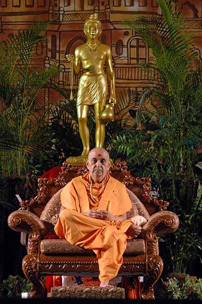 morning ,Swamishri seated in the assembly after his pooja 	