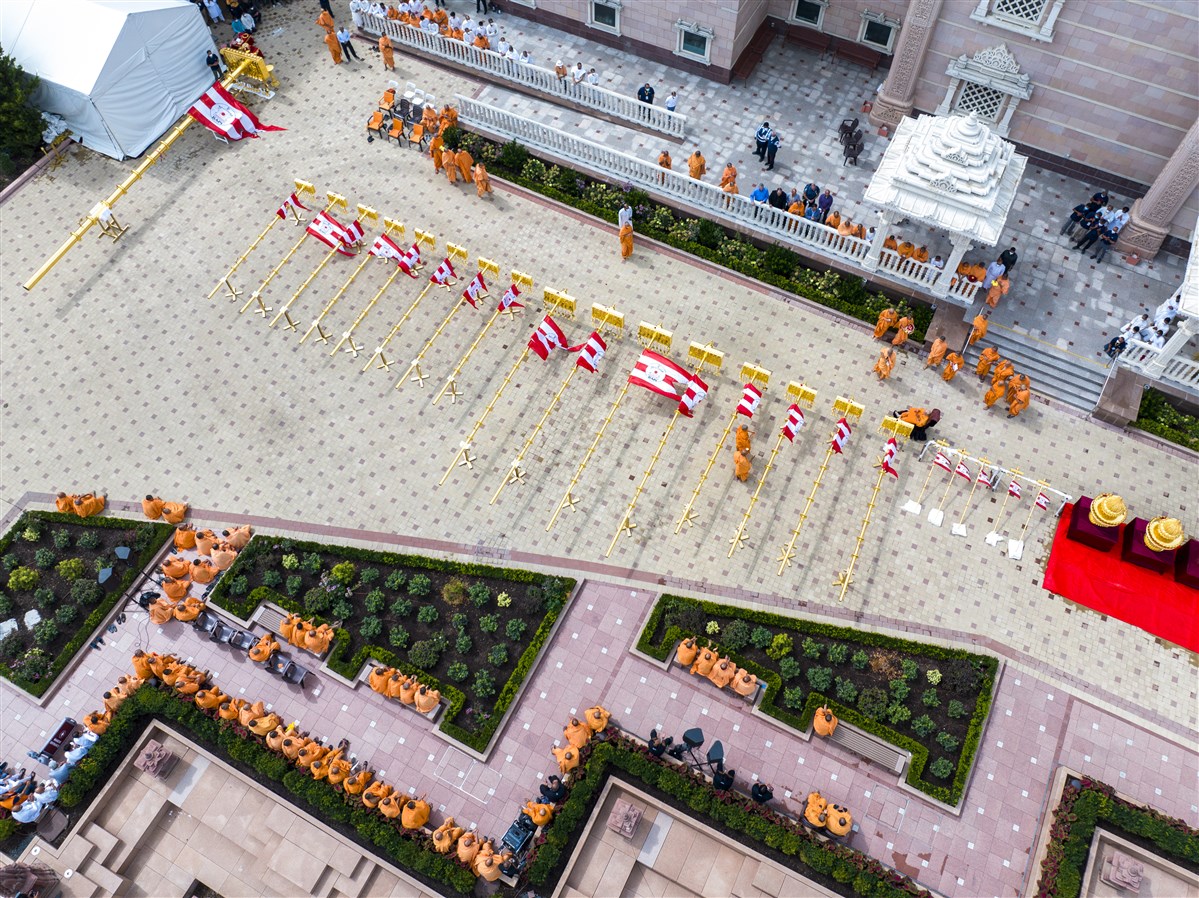 Aerial view of the Dhaja Dand Pujan. <br>For more information and photos of the event, please click <a href="https://www.baps.org/News/2023/Dhaja-Dand-Pujan-24058.aspx" target="blank" style="text-decoration:underline; color:blue;">here</a>