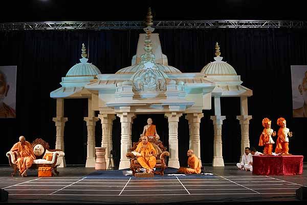 Morning ,Swamishri seated in the morning session in front of a replica of the Yagnapurush Smruti Mandir 