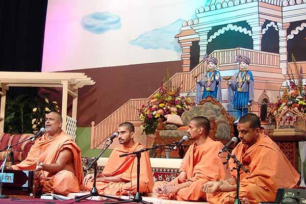  Saints sing and play musical instruments during the kirtan aradhana