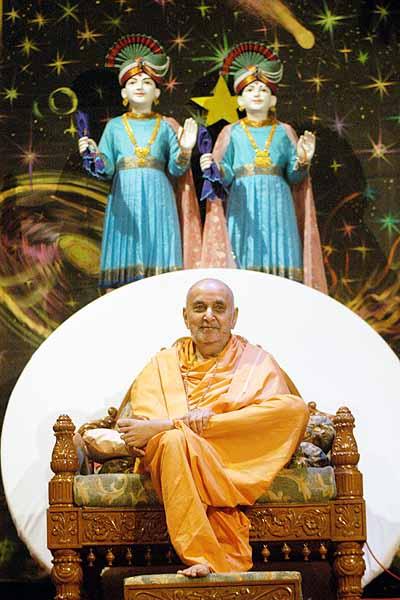 Balika Din, July 16, 2004 - Swamishri seated in the Bal-Balika Din evening assembly 