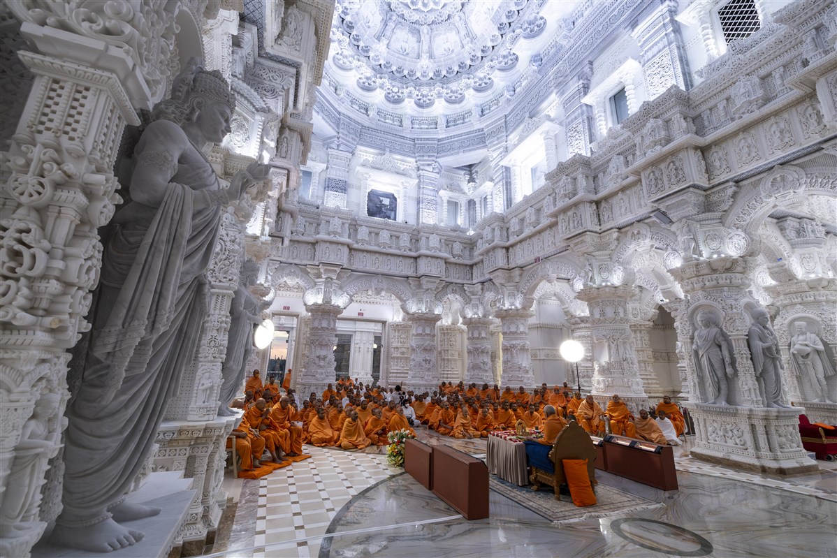 A unique view of Swamishri performing puja under the central dome of BAPS Swaminarayan Akshardham