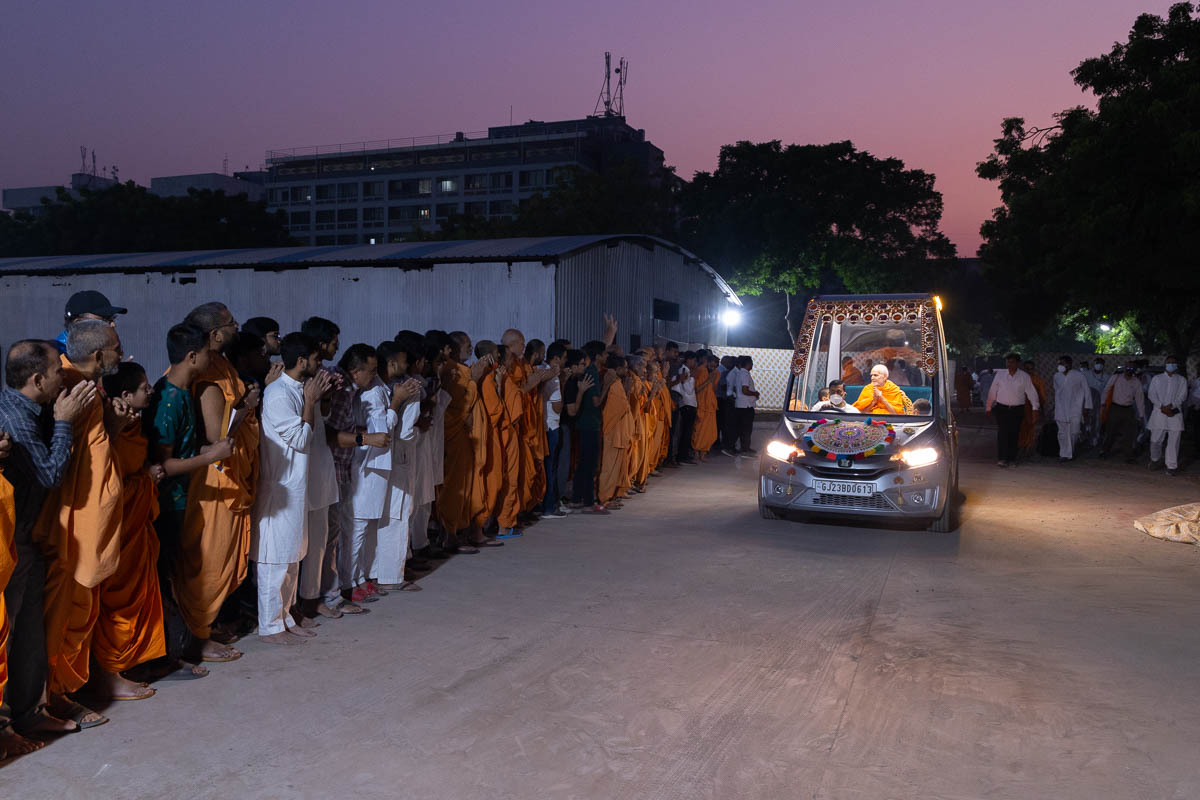 Swamishri on his way for his daily puja