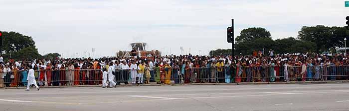 Spectators watch the jubilant Nagar Yatra 