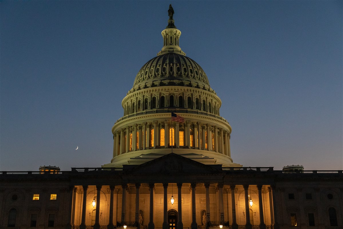 The United States Capitol at dusk