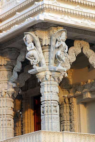 Hindu deities placed at the top of the carved pillars