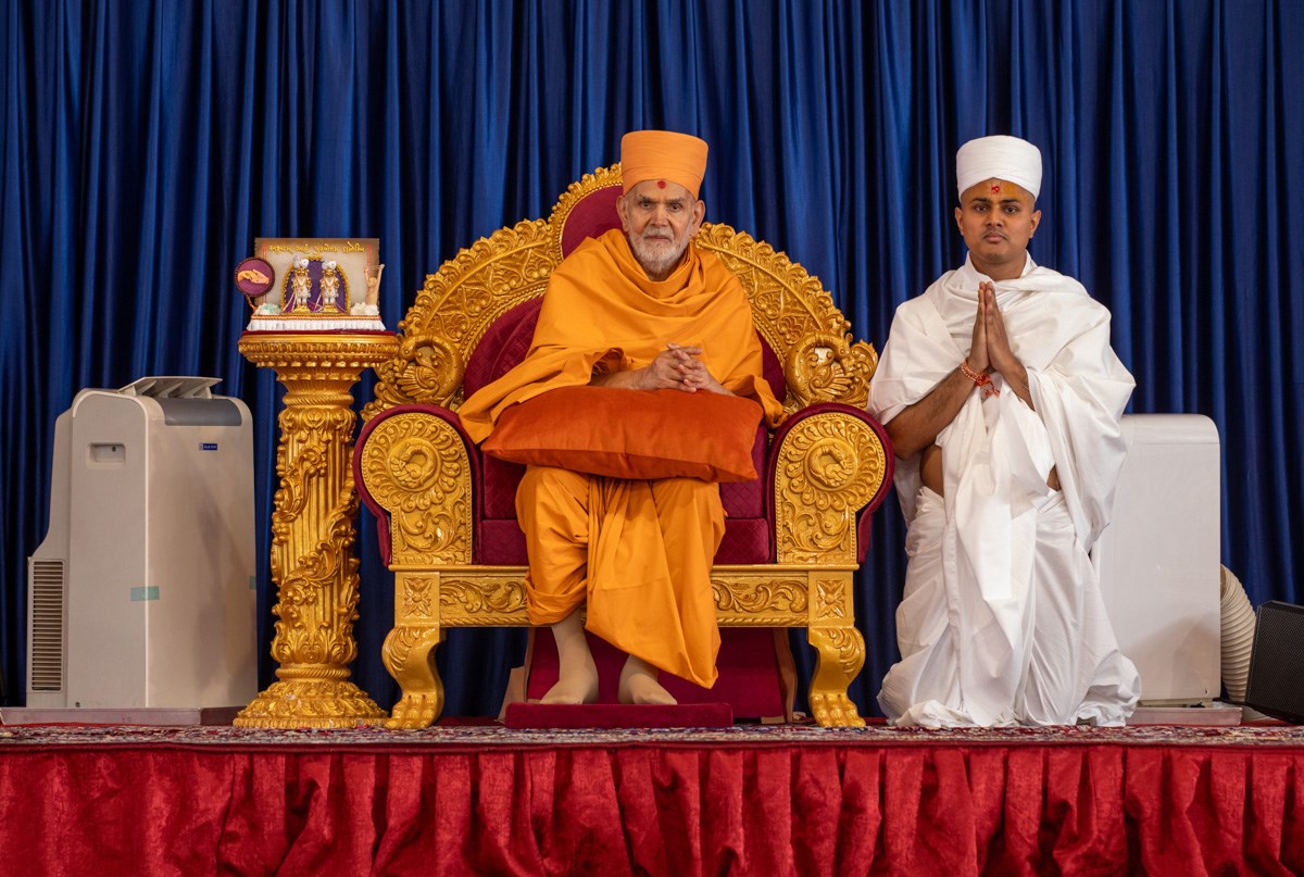 Swamishri with a newly initiated parshad