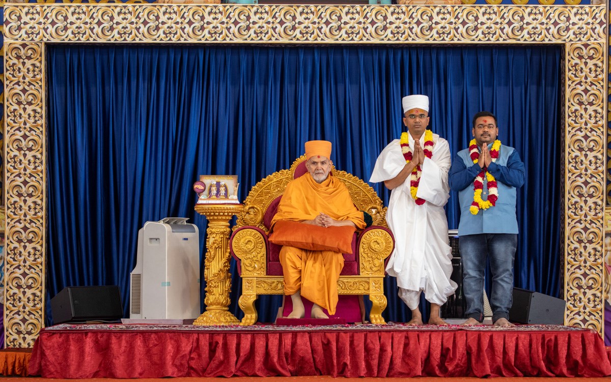 Swamishri with a newly initiated parshad and his relative