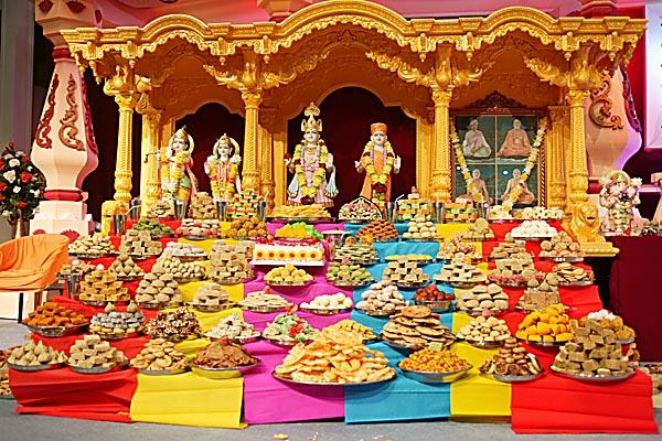  Annakut is offered to the newly installed images of Akshar Purushottam Maharaj, Radha Krishna Dev, Guru Parampara, Ganpatiji and Hanumanji