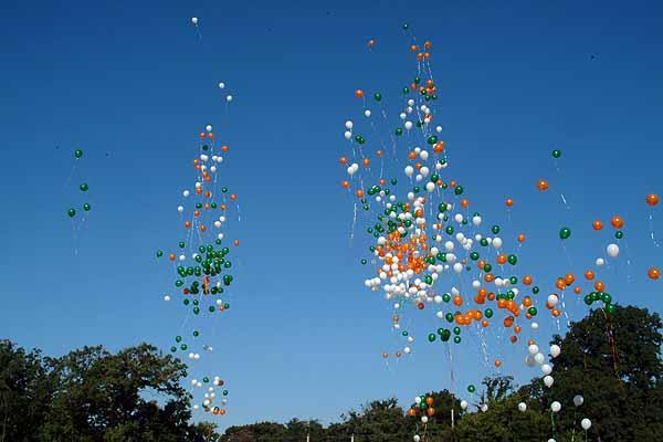 Balloons representing the colors of the Indian flag are released in the air