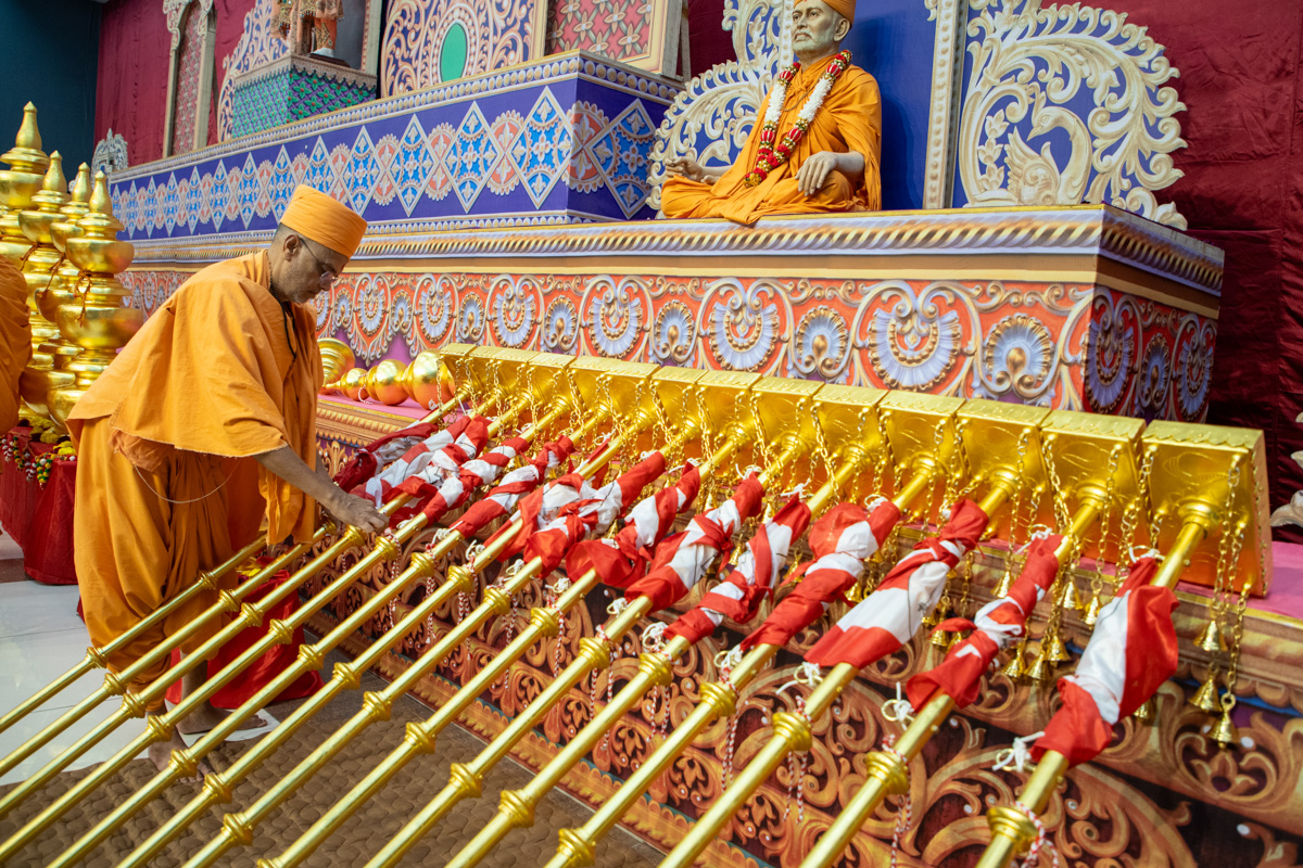 Narayanmuni Swami performs pujan of the flagstaffs