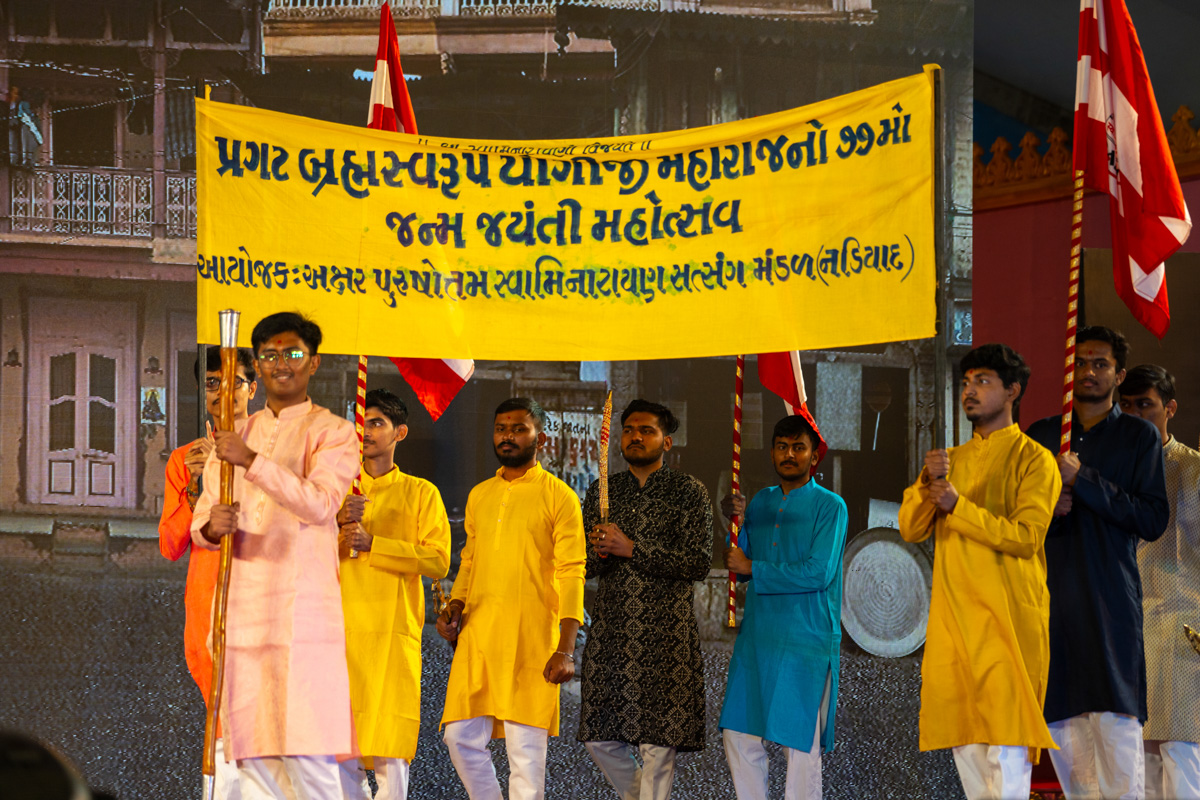 Youths perform a parade during the presentation