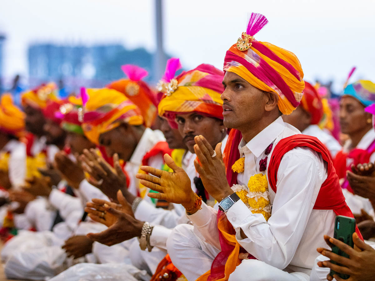 Tribal youths doing darshan of Swamishri
