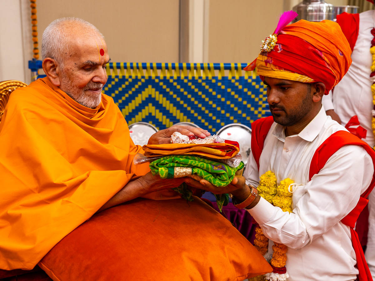 Swamishri blesses a tribal youth