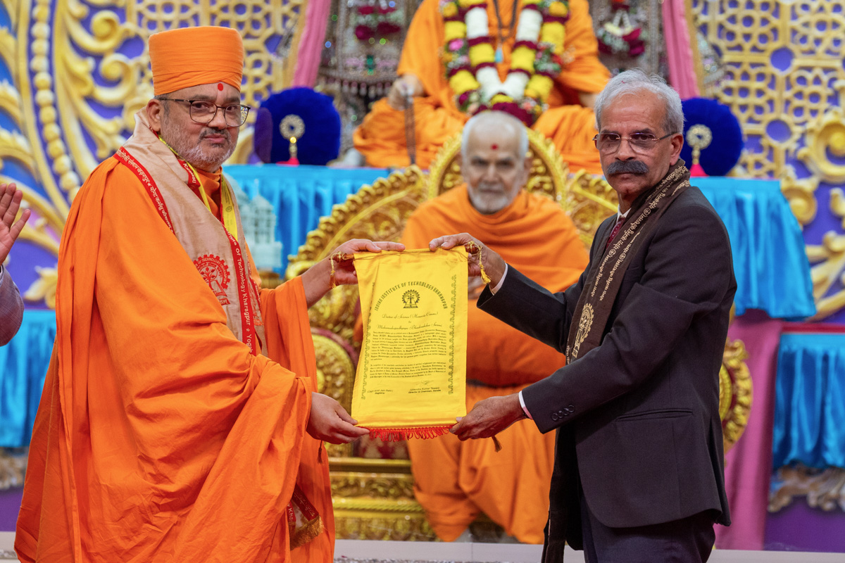 Prof. Virendra Kumar Tewari presents a Doctor of Science (D.Sc. Honoris Causa) certificate to Bhadresh Swami
