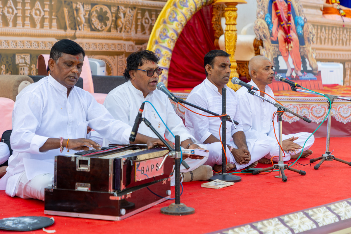 Youths sing kirtans in the welcome assembly