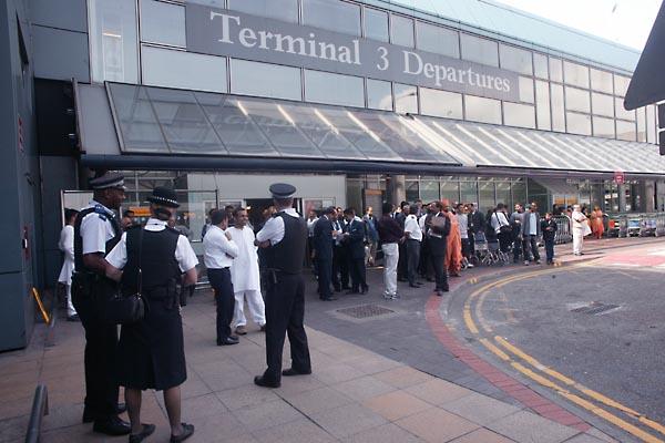  Awaiting Swamishri's arrival at London Heathrow's Terminal 3 - Departures