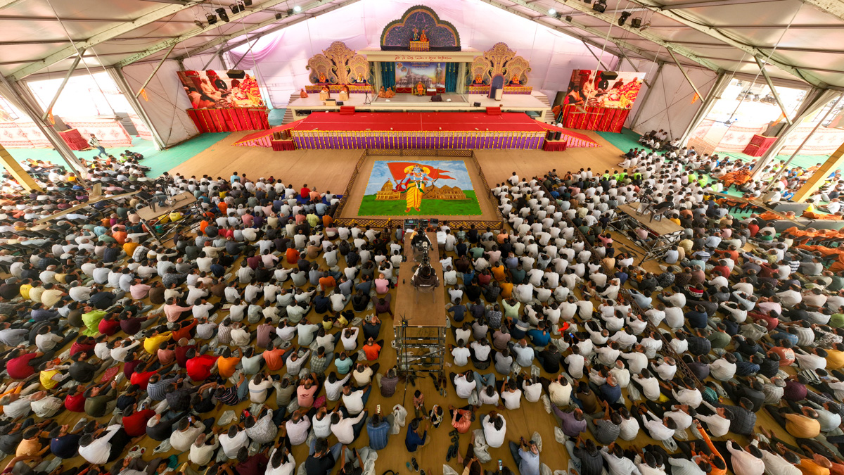 Swamis and devotees watch live webcast